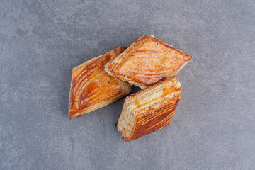 Homemade crispy pastries on marble background