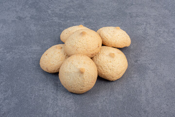 Round delicious cookies on marble background