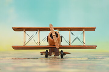 Wooden model of the aircraft with two wings and propeller