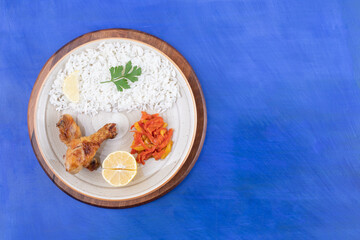 Grilled chicken legs meat with tasty rice