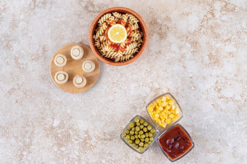 Delicious pasta with mushrooms on a marble background