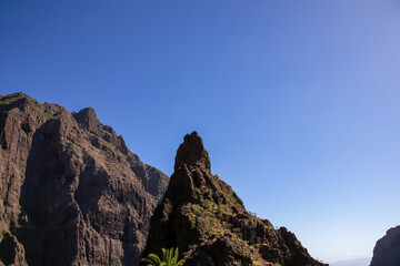Sharp pinnacle in centre of remote tourist village Masca in the Teno mountain range, Tenerife,...