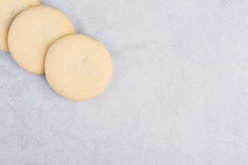 Cookies neatly bundled up on marble background