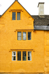 Fototapeta premium British town architecture. Simple middle-class building. The urban village of Corsham UK. Townhouse facade.