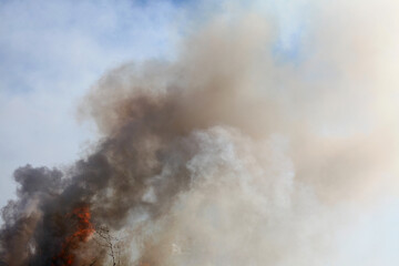 Abstract smoke fire on sky background.