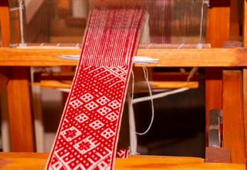 Belt Lielvardes on a loom - National symbols of Latvia