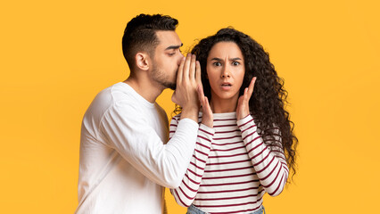 Big Secret. Young Arab Man Sharing Information With His Shocked Girlfriend