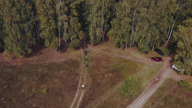 Aerial photography of a trail race in nature, people running in nature