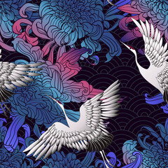 Fototapeta premium white cranes are flying on a black background with chrysanthemums and peonies. Vector seamless pattern