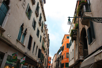 Fototapeta na wymiar Vintage streets and historic stone houses in Venice, Italy