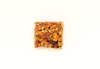 Top view Peanut croquant dessert with white background. Open space area.