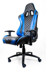 Sport design gaming armchair made of black and blue leather, Side view, isolated on white background