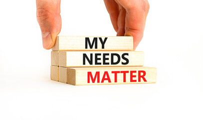 My needs matter symbol. Concept words My needs matter on wooden blocks. Businessman hand. Beautiful white table white background. Business, psychological and my needs matter concept. Copy space.