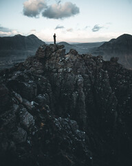 person on the top of a mountain