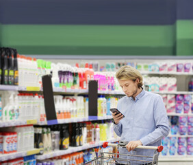 shopping in supermarket.(washing powder,detergent,shampoo, soap)
