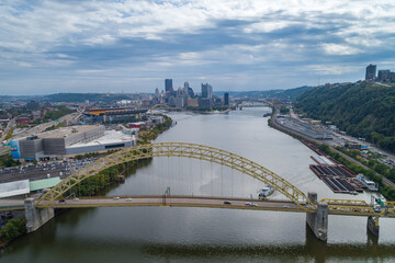Fototapeta premium West End Bridge in Pittsburgh, Pennsylvania. Beautiful Cityscape, Skyline in Background. Cloudy Blue Sky