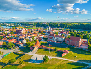Landscape aerial photo of Kaunas old town. City town hall square with towers of churches, castle, cathedral and Neris river around