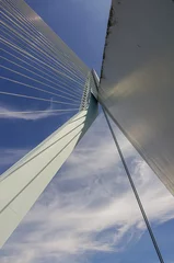 Acrylic prints Erasmus Bridge Rotterdam, Netherlands - July 11, 2022: Erasmusbrug, bridge. Fisheye of the Swan's. neck with the cables, all white construction against blue cloudscape
