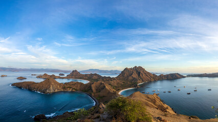 Famous view on Padar Island of Komodos, Indonesia. Panorama shows the landscape in all its glory at sunrise.