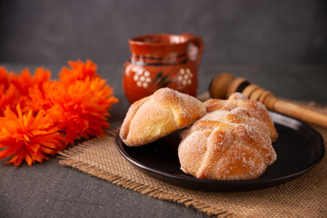 Pan de Muerto. Typical Mexican sweet bread that is consumed in the season of the day of the dead. It is a main element in the altars and offerings in the festivity of the day of the dead.