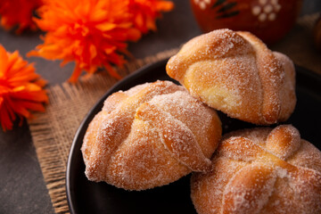 Pan de Muerto. Typical Mexican sweet bread that is consumed in the season of the day of the dead. It is a main element in the altars and offerings in the festivity of the day of the dead.