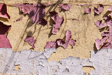 Peeling paint on a wall in Luxor.