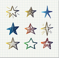 Obraz premium Set of black hand drawn doodle star isolated on paper background.