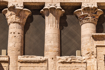 Decorated columns in the Temple of Horus at Edfu. - obrazy, fototapety, plakaty