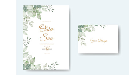 Watercolor wedding invitation card in green leaves 