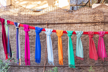 Colorful scarves hanging on a line in Luxor.