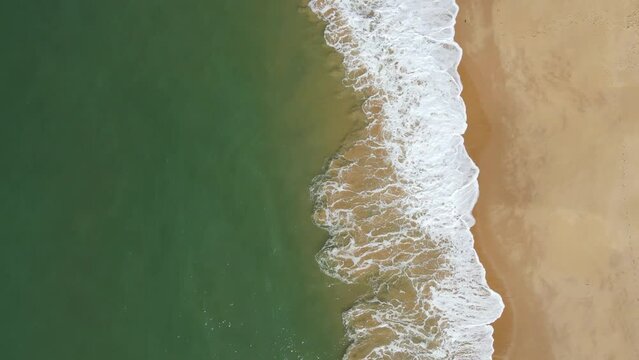 Aerial drone image of Riacho beach in Guarapari a Cidadae Sa&uacute;de. Tourist destination for thousands of people in summer.