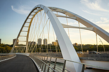 Close-up of suspension bridge in Edmonton, Alberta, Canada at dusk - Powered by Adobe