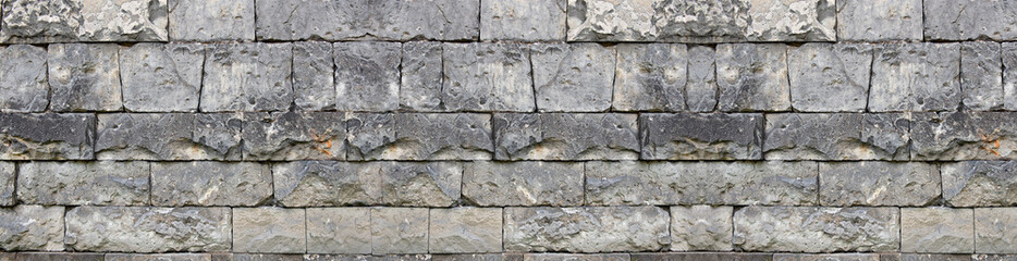 Texture of grey stone wall as background. Banner design