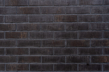 Black brick wall texture background. close up