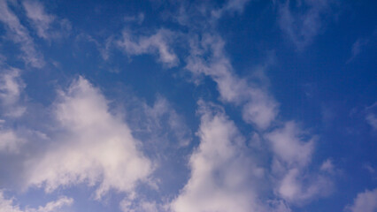 Naklejka na ściany i meble Beautiful sky with cloud in winter afternoons. Dramatic cloudy sky