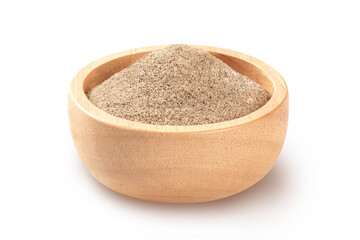 Ground pepper in wooden bowl on white background.