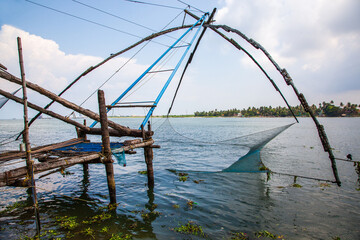 Fototapeta na wymiar Traditional Chinese fishing nets at Fort Kochi in Kerala, India. 