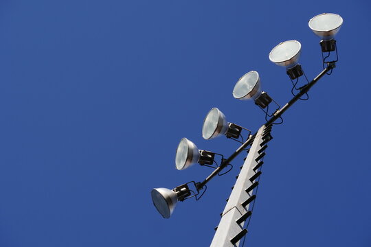 Light Tower At High School Football Field During Late Afternoon