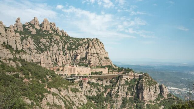 Abbey of Montserrat - Santa Maria de Montserrat Abbey On The Mountain In Catalonia, Spain. - wide timelapse