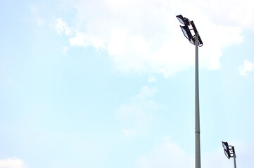 Roadlight with the blue sky and cloud.