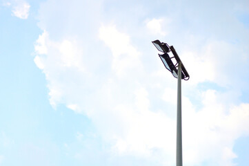 Roadlight with the blue sky and cloud.