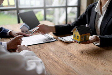 Real estate agent and couple enter into contracts for the sale of houses and land Approval of a...