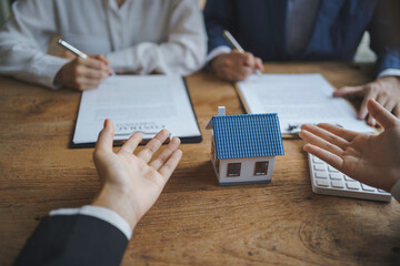 Real estate agent and couple enter into contracts for the sale of houses and land Approval of a...