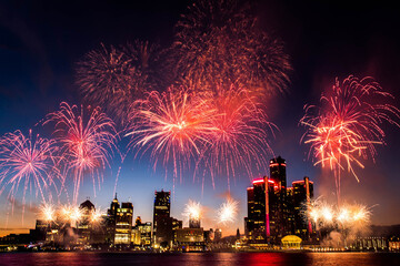 White Fireworks going off during the Detroit Ford Fireworks as seen from the riverwalk in Windsor, Ontario