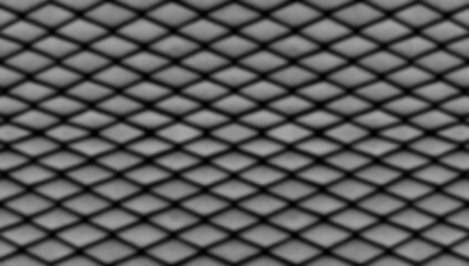 Black color mesh pattern seamless background (Blur focus)