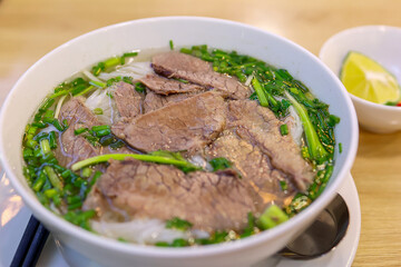 Vietnamese noodles with beef and vegetables