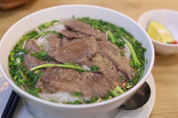 Vietnamese noodles with beef and vegetables