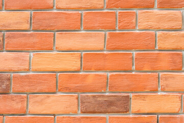orange brown artificial Brick Foam background at outdoor field.