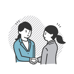 握手をする働く女性
