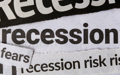 Economic recession dominating headline business news in major newspapers. Clippings of newspaper headline titles reporting on economic recession. Closeup macro view. - obrazy, fototapety, plakaty